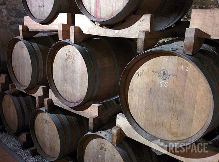 Professional Architectural Photography Wine barrels in racks.