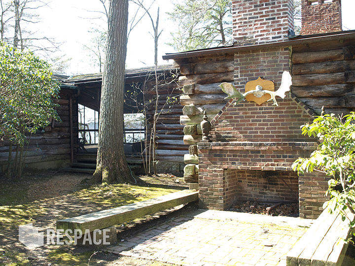 Professional Architectural Photography Exterior fireplace at Private Cabin in Maryland