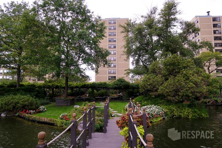 Professional Architectural Photography from footbridge viewing Regents Park Apartments Bird Sanctuary