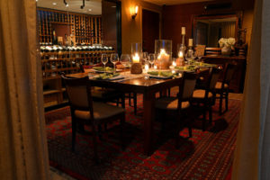 Image of a candlelit table to seat 10